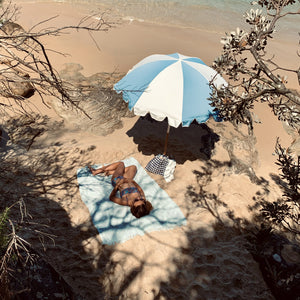 Basil Bangs Mineral Weekend Umbrella: Stylish, weather-resistant, UPF50+ protection for beach lounging or exploring. Ultimate functionality meets style.